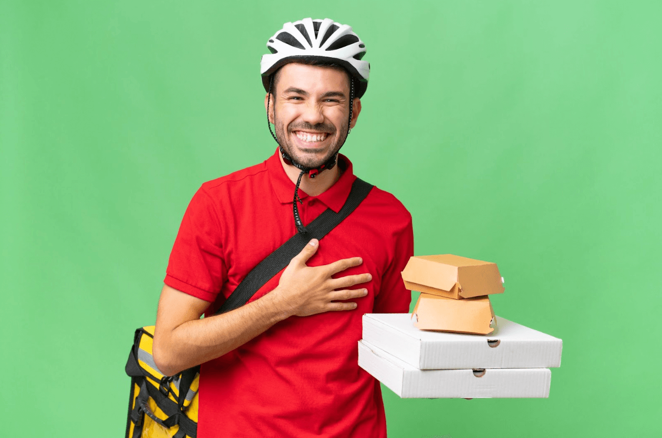 delivery driver smiling with parcel